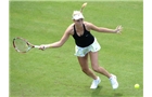 BIRMINGHAM, ENGLAND - JUNE 09:  Donna Vekic of Croatia returns a shot from Belinda Bencic of Switzerland on day one of the AEGON Classic Tennis Tournament at Edgbaston Priory Club on June 9, 2014 in Birmingham, England.  (Photo by Tom Dulat/Getty Images)